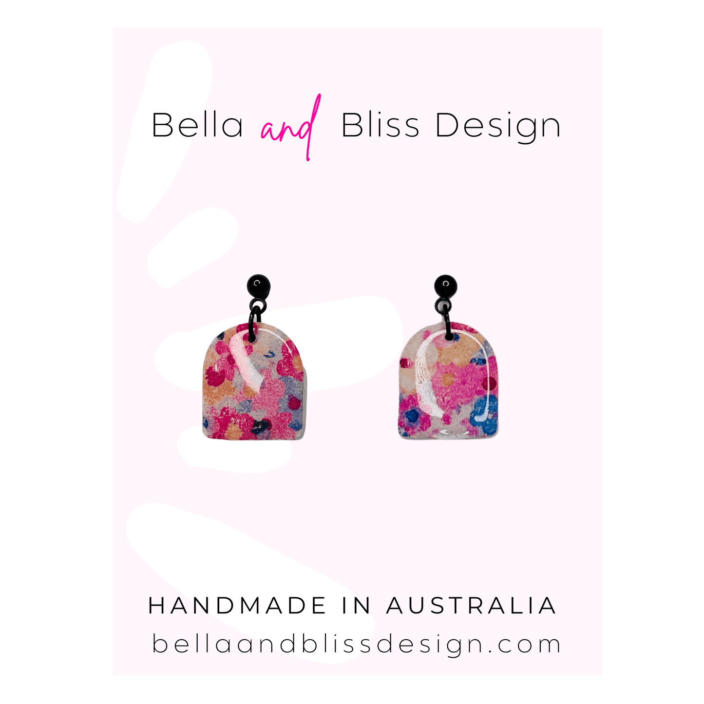 Colorful earrings with floral design on a white background, branded as Bella and Bliss Design.