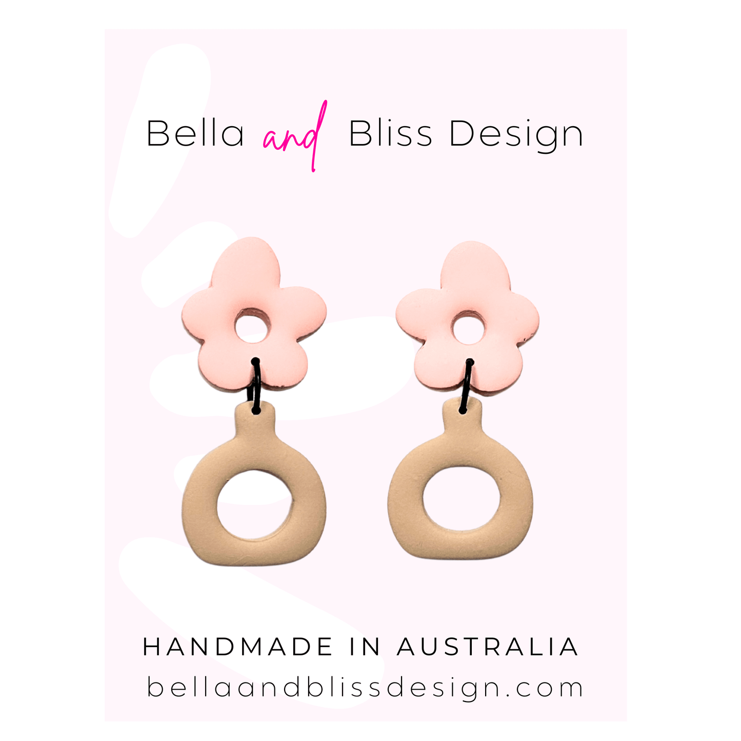 Flower-shaped earrings with pink floral tops and beige circular bases on a light pink background, featuring 'Bella and Bliss Design'.