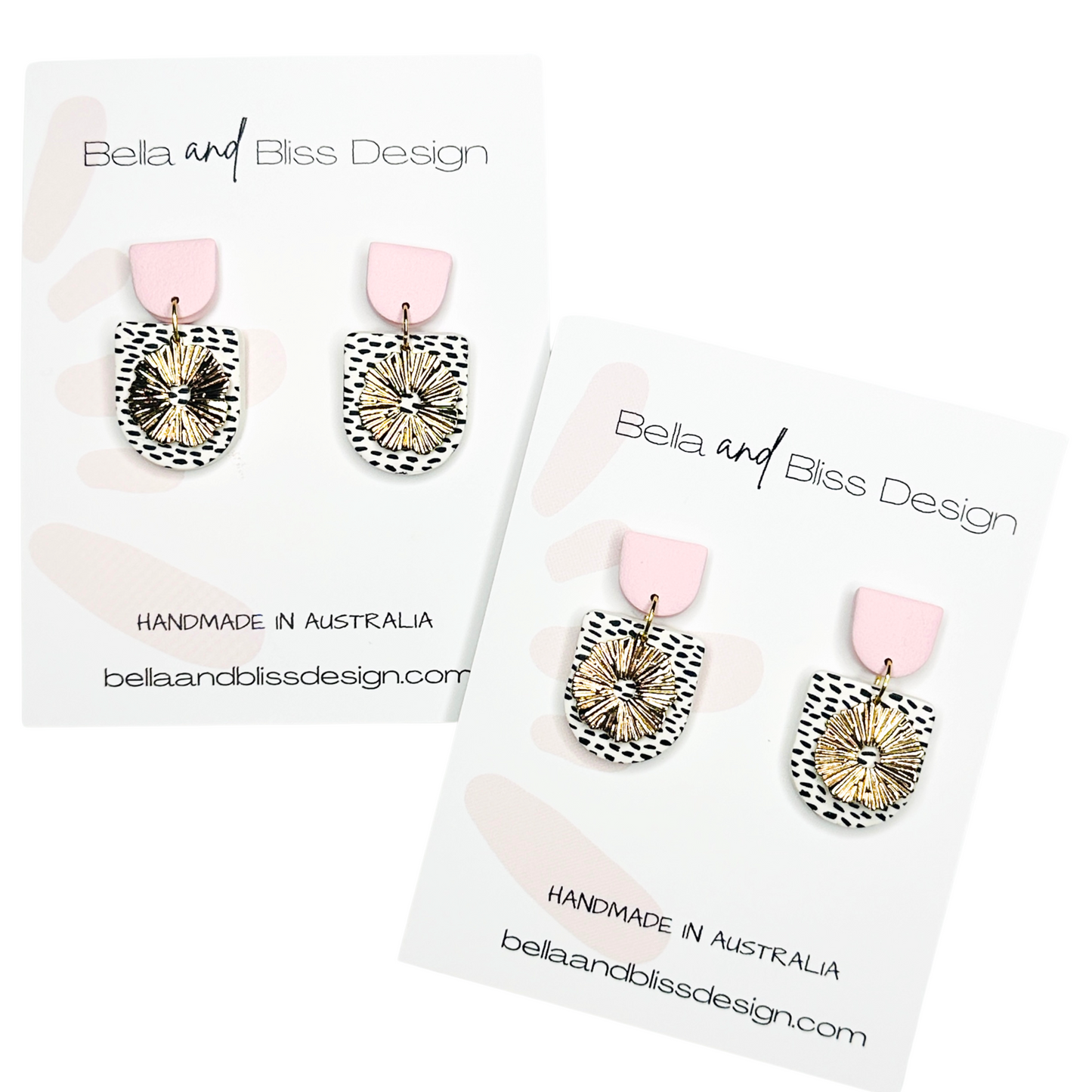 Light pink top on black dot on white clay with gold flower