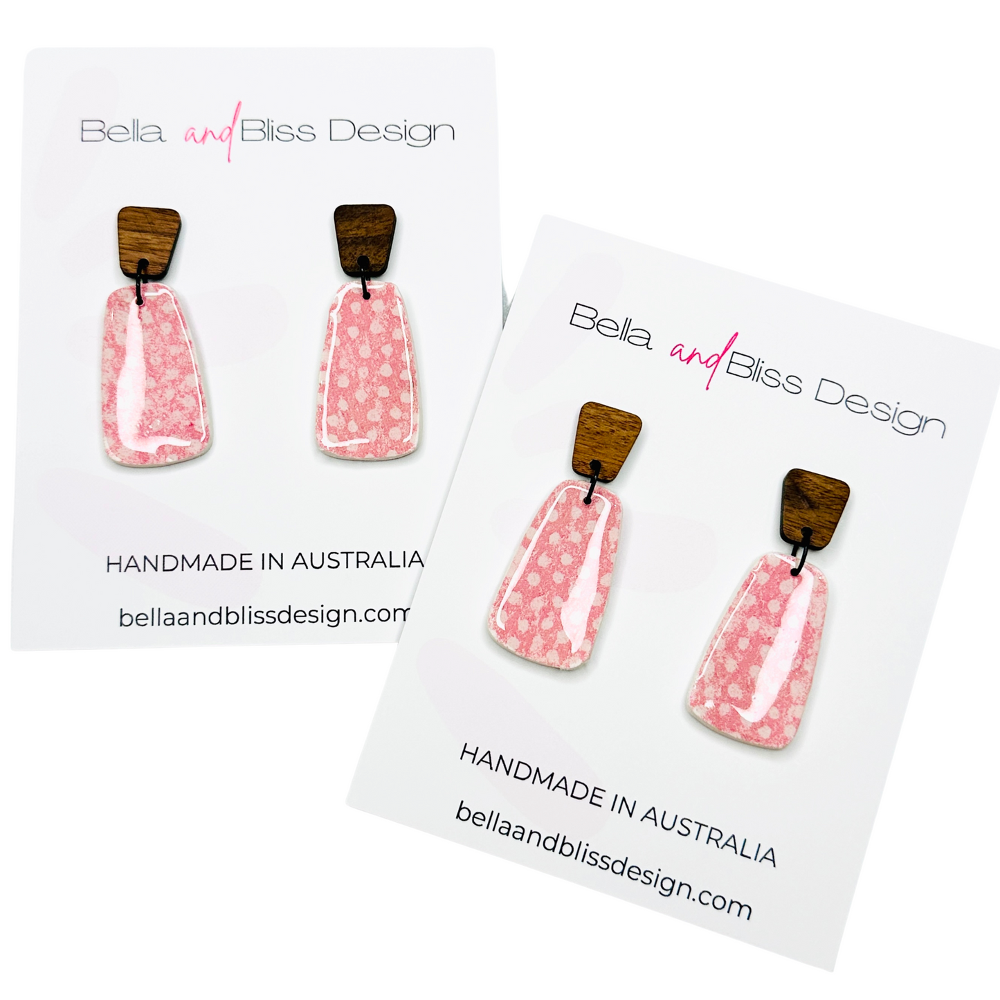 Pink earrings with wooden tops on a white background, featuring 'Bella and Bliss Design'.