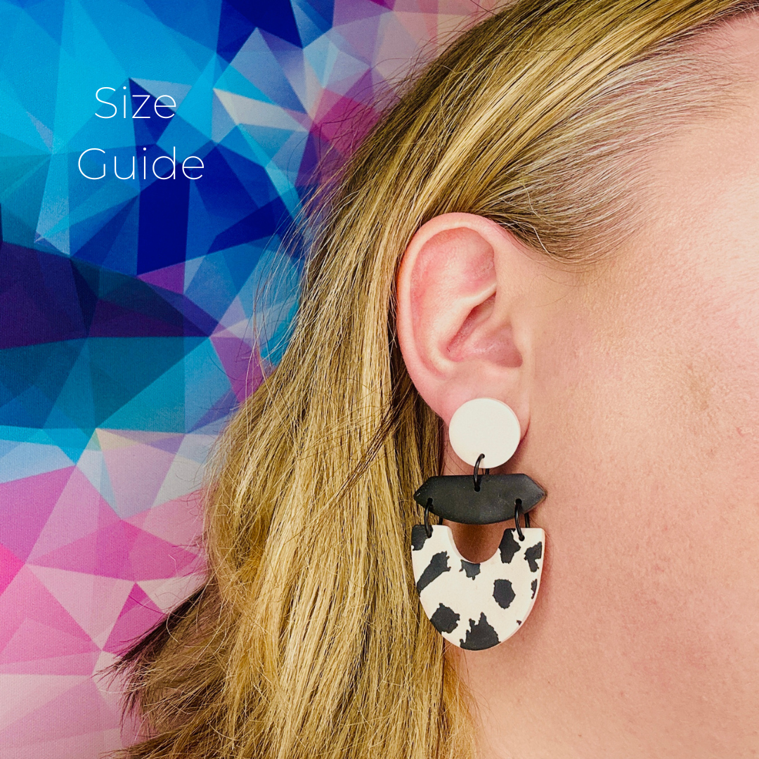 Earring size guide on a person