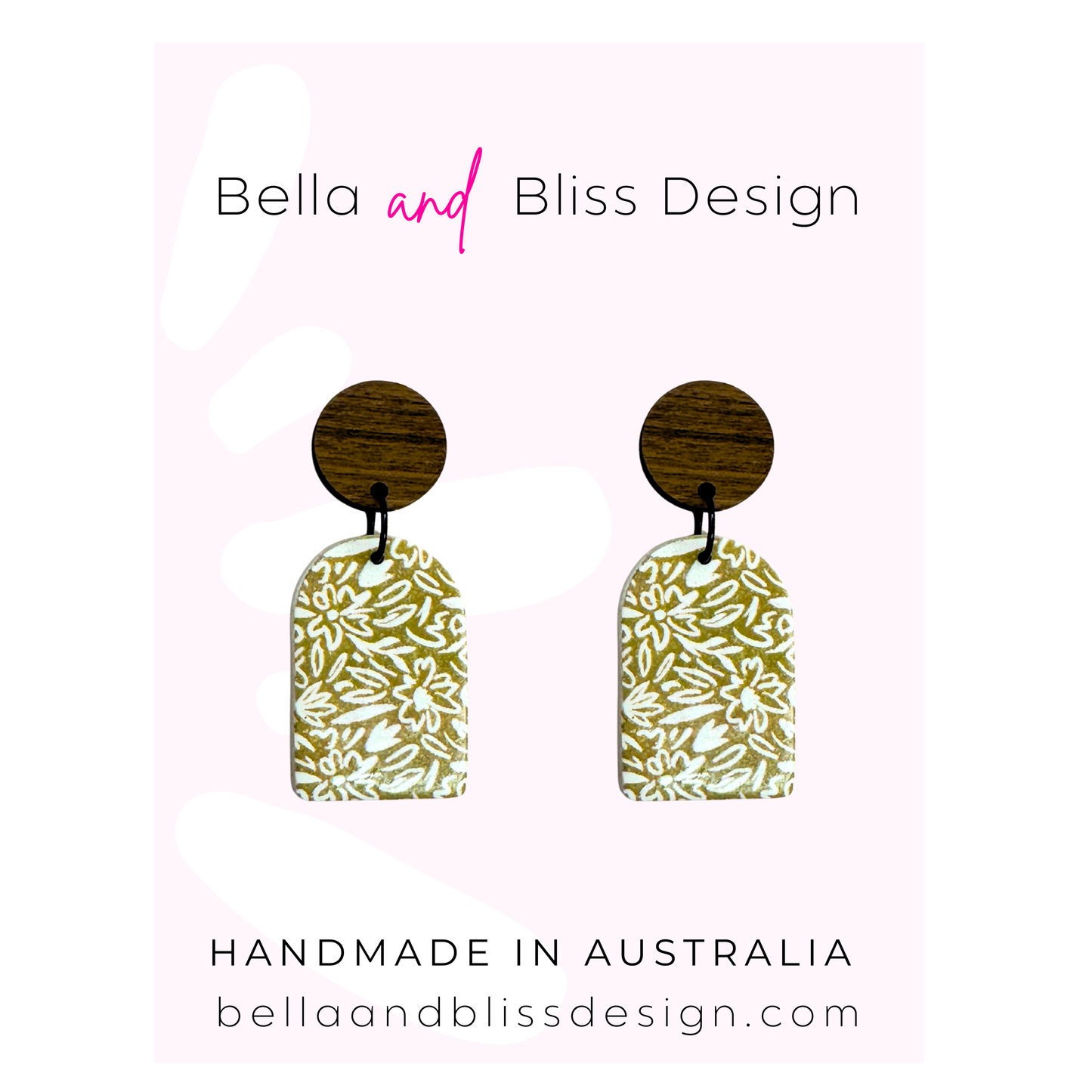Floral earrings on a card with 'Bella and Bliss Design' branding.
