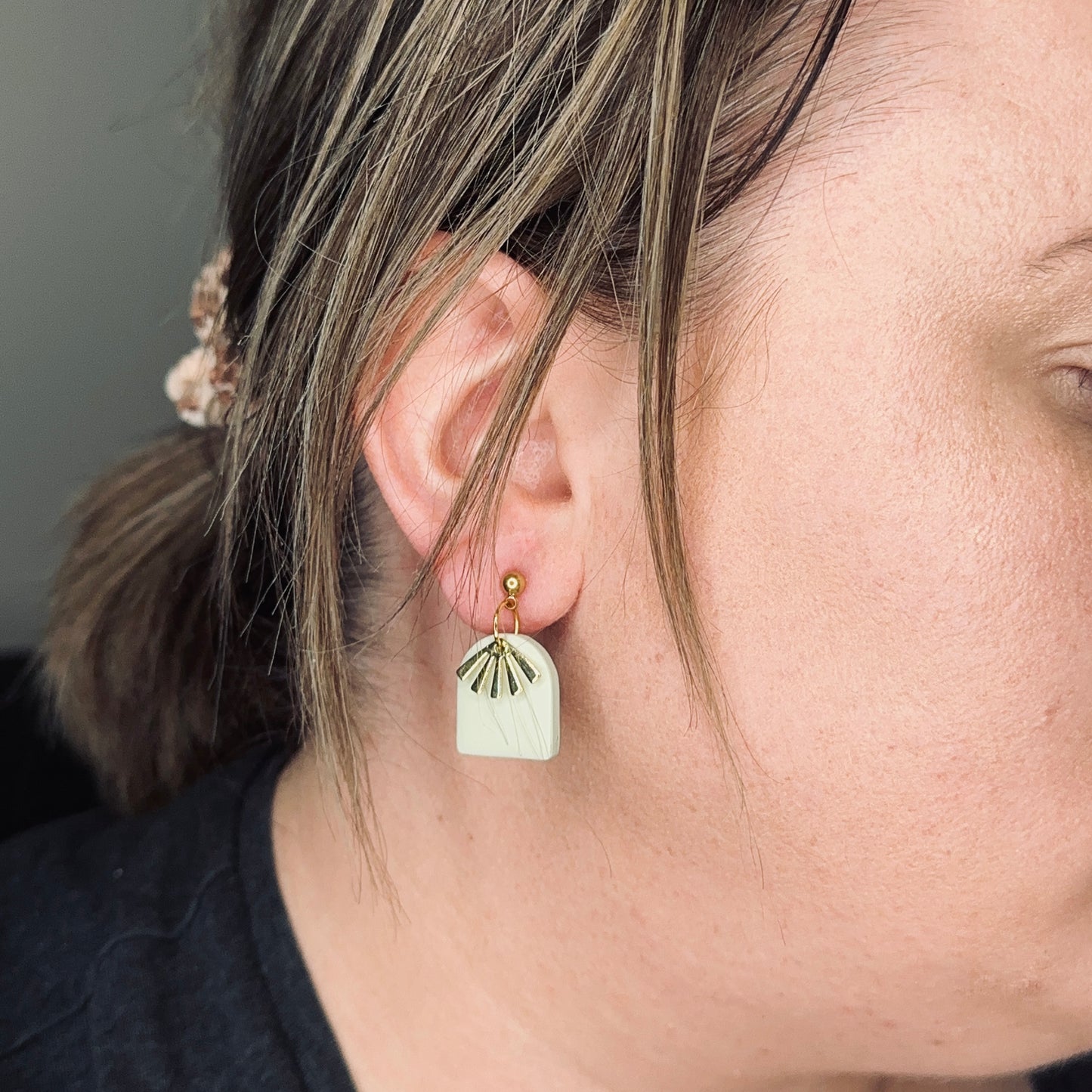 Earring size guide on person