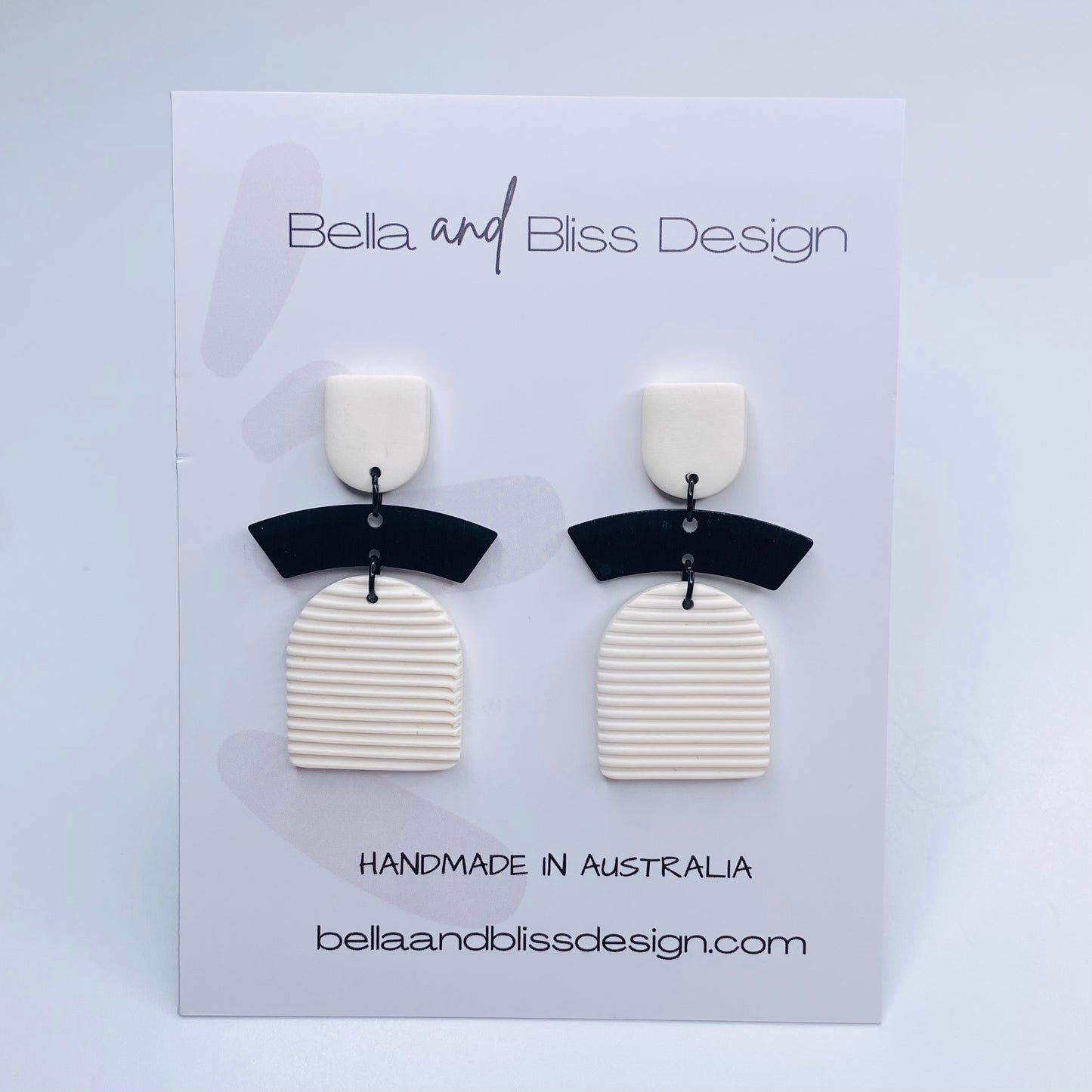 Betty // Clay Dangle Earrings // Embossed Black with Gold and White with Black