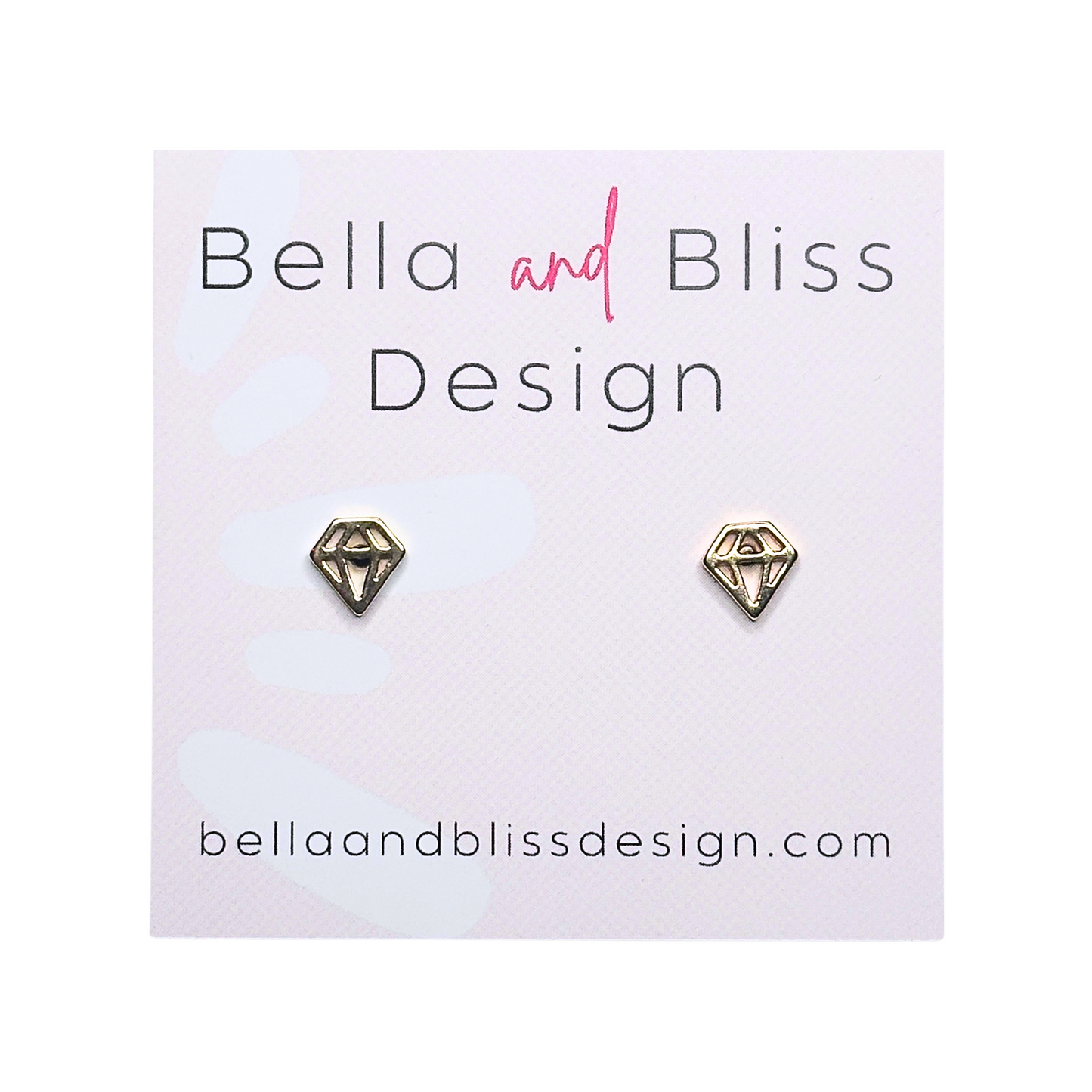 A pair of 18K gold plated mini stud earrings displayed on a branded card with 'Bella and Bliss Design' written on it.
