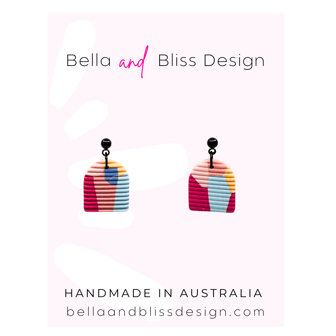 Bella and Bliss Design flower-shaped teether toys on a white background
