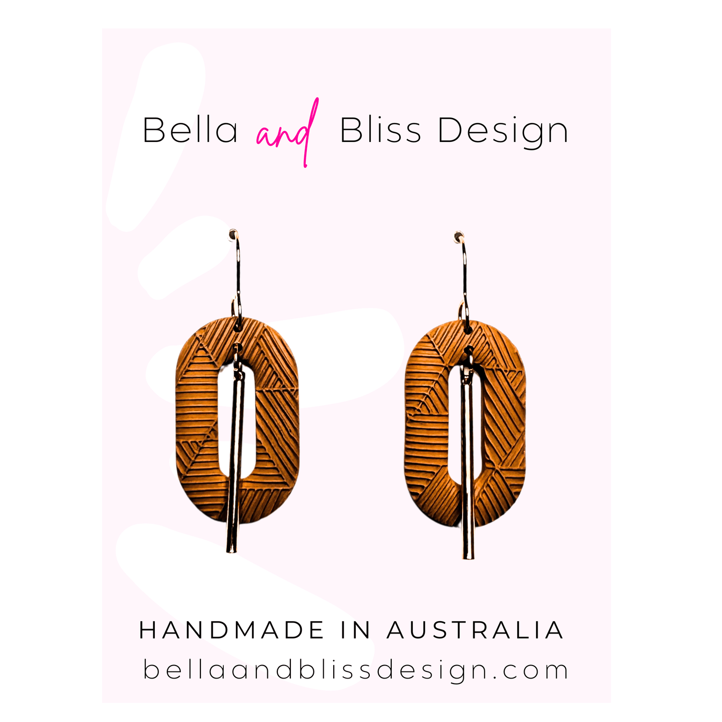 Caramel earrings with intricate design on a light pink background, featuring 'Bella and Bliss Design'.