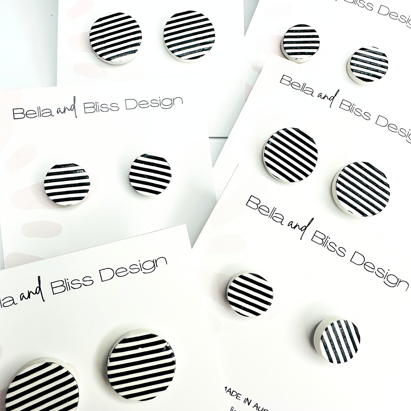 Black and white striped studs