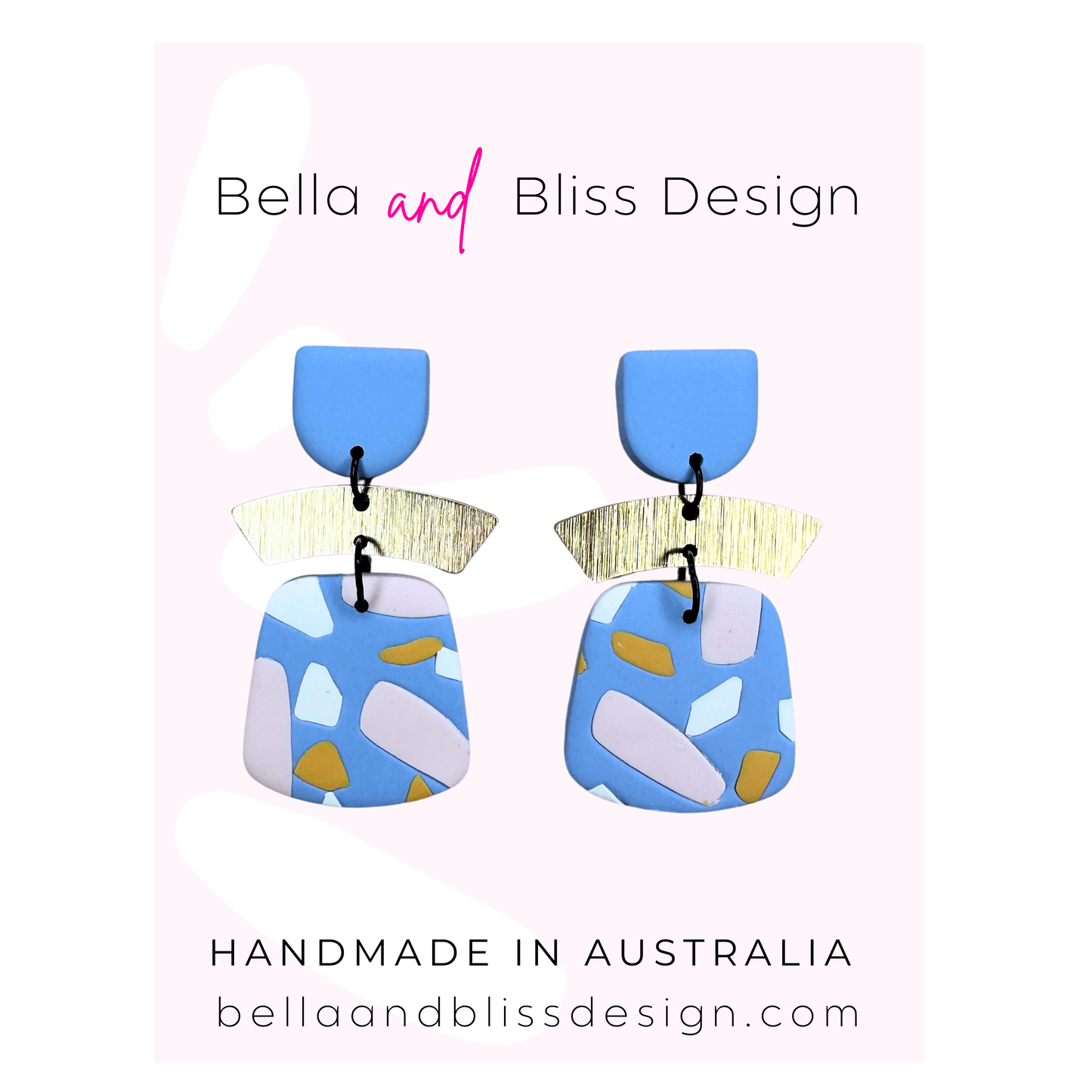 Colorful earrings with geometric design on a light pink background, featuring 'Bella and Bliss Design'.