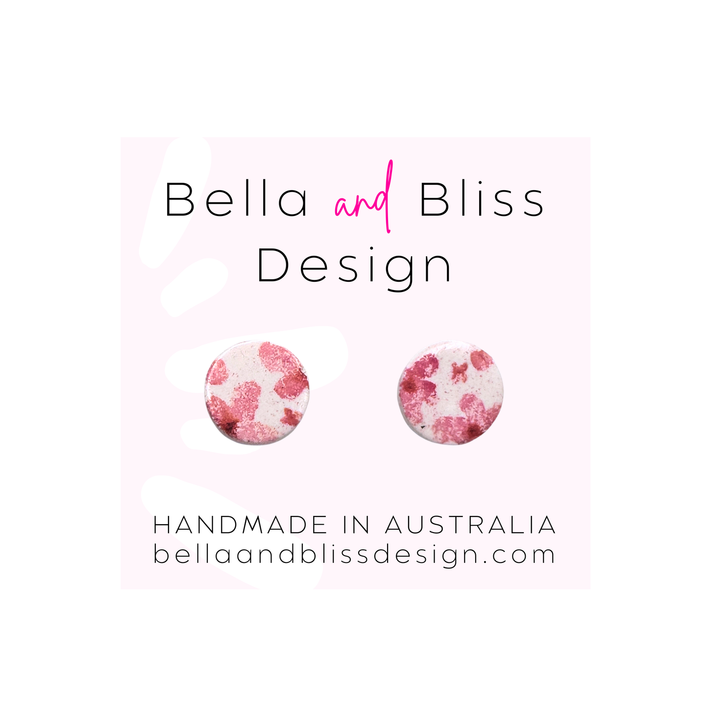 Floral earrings with 'Bella and Bliss Design' branding on a light pink background