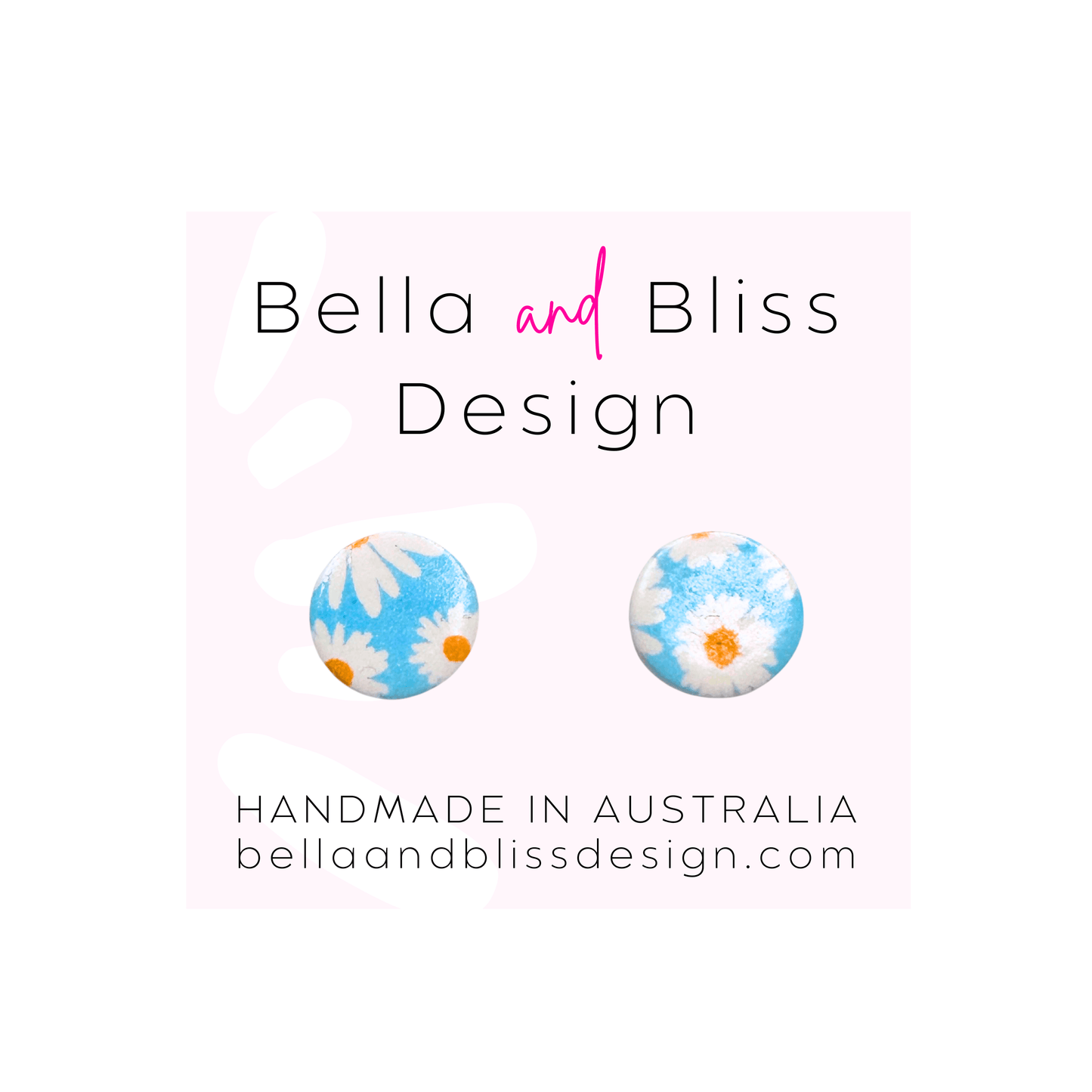 Pair of floral earrings with 'Bella and Bliss Design' branding on a light pink background.