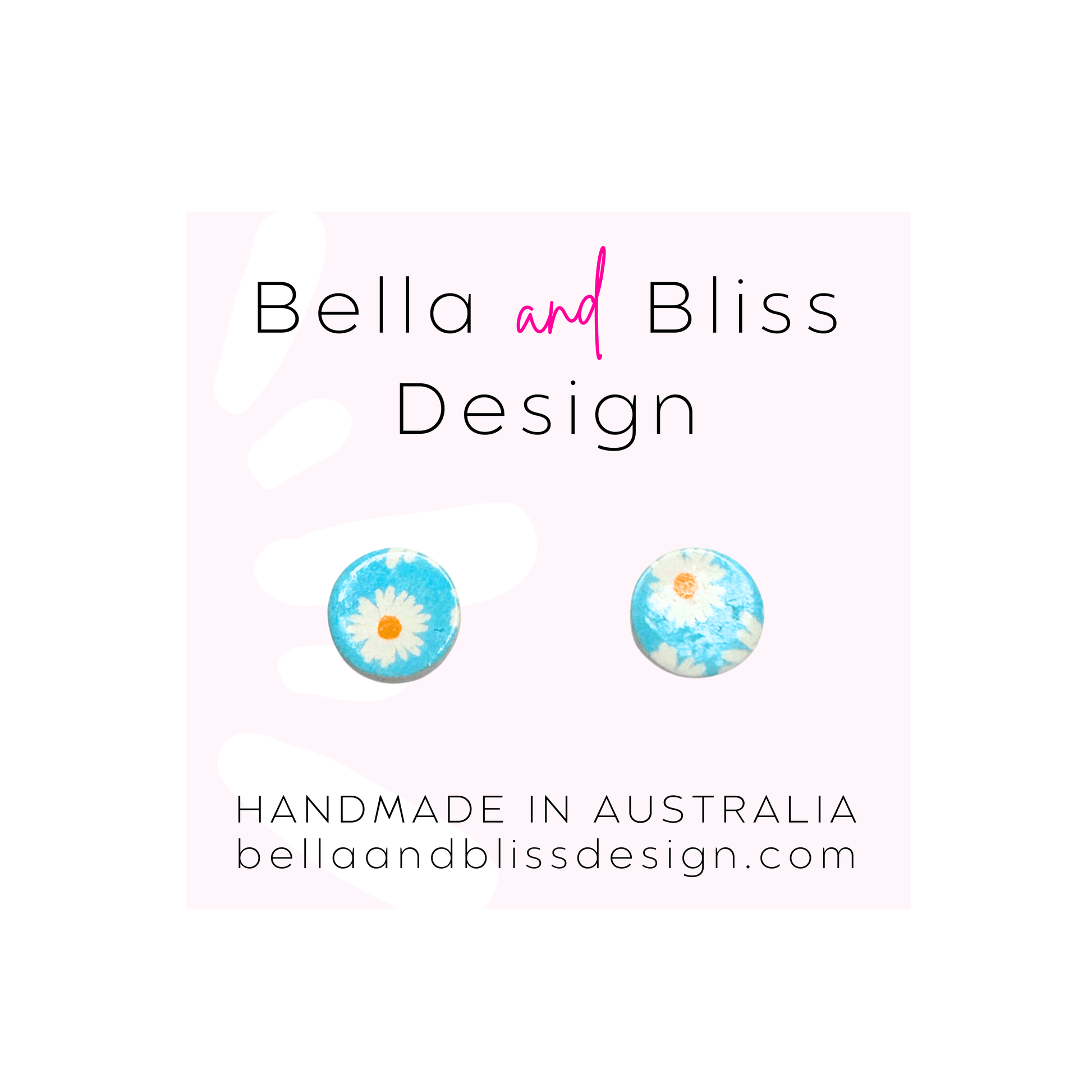 Bella and Bliss Design earrings with a floral design on a light pink background
