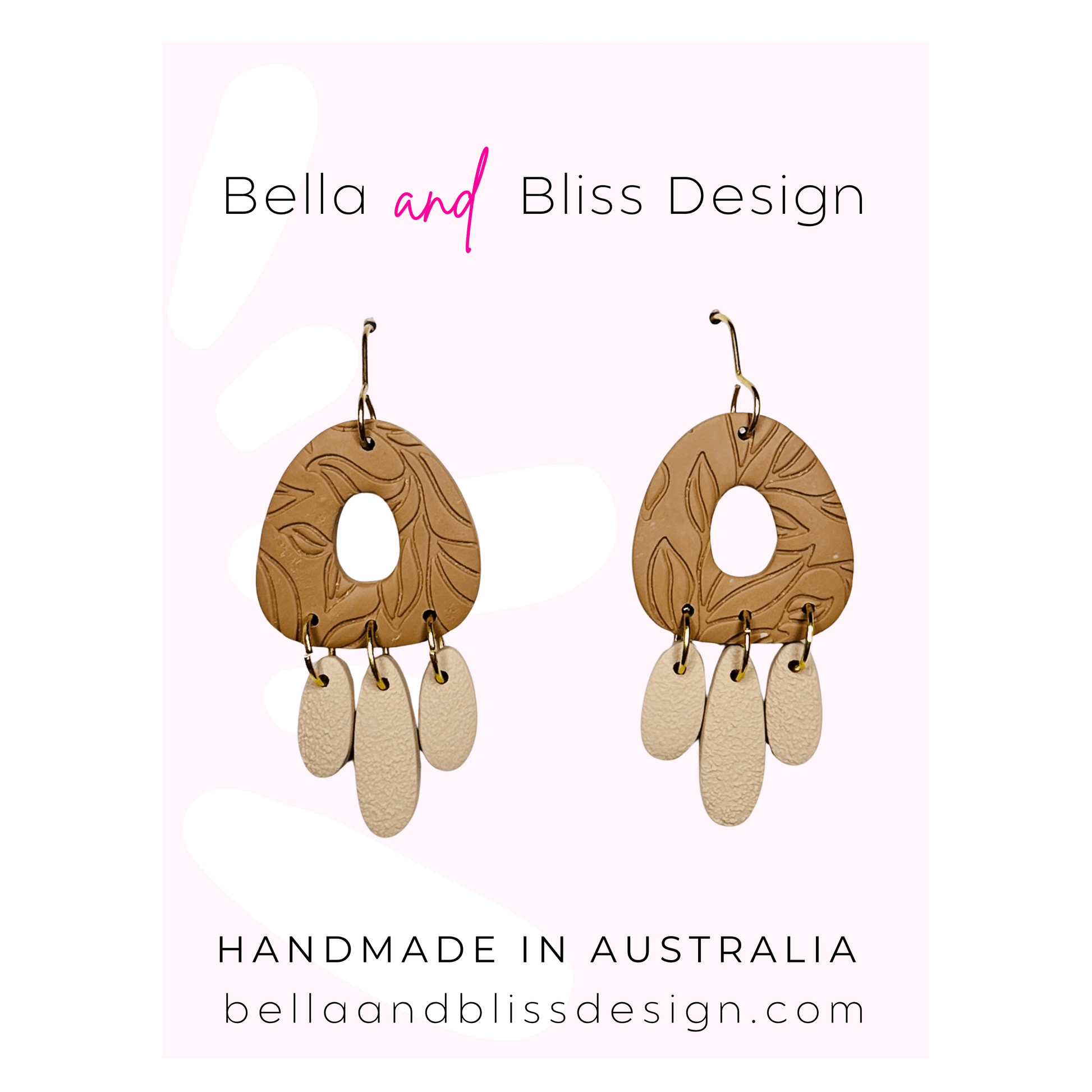 Polymer clay earrings with leaf patterns on a pink background with Bella and Bliss Design branding.