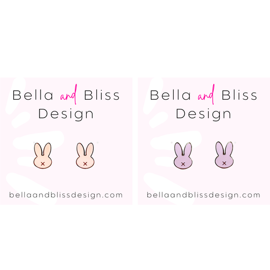 Bella and Bliss Design logo with cartoon bunnies on a white background