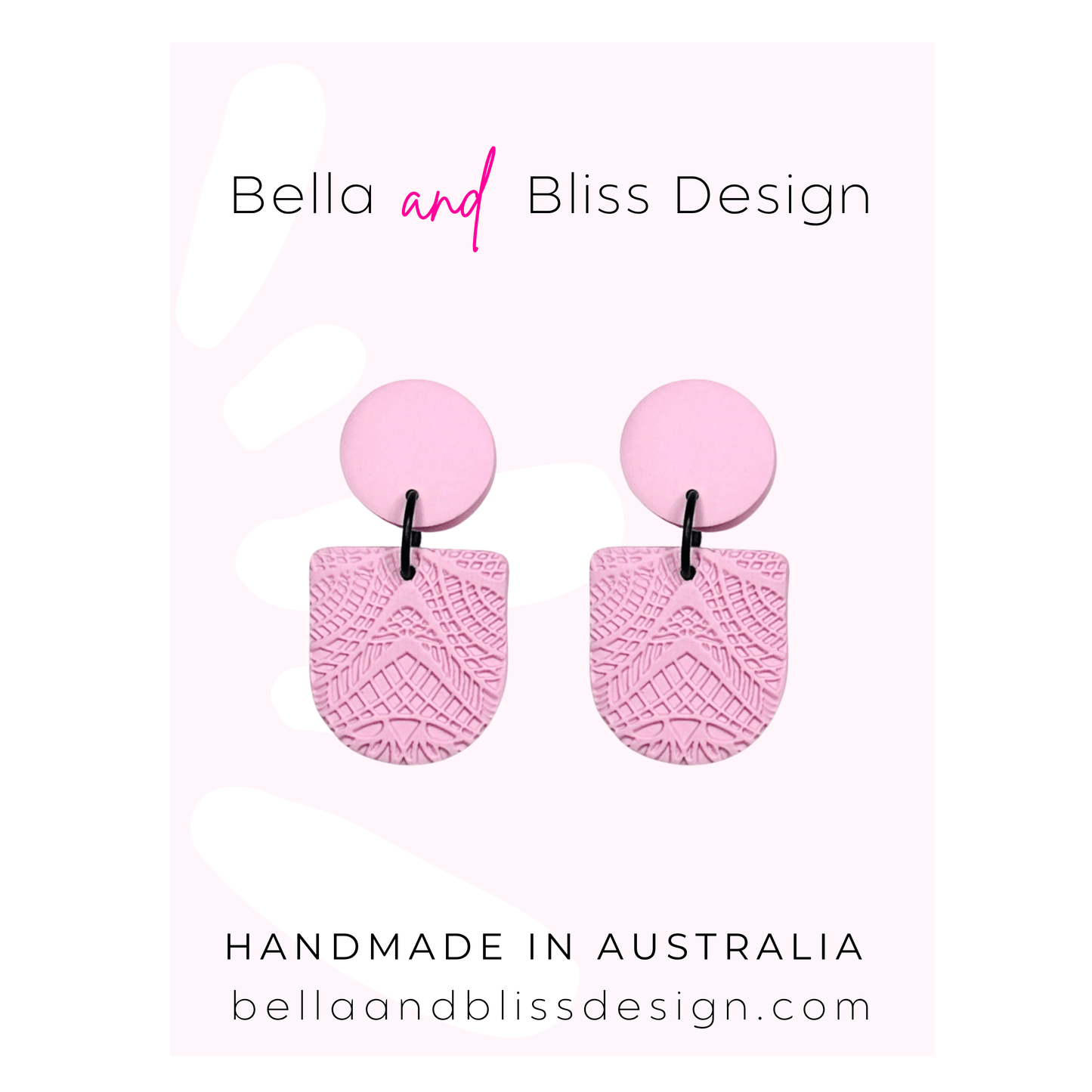 Pink earrings with textured design on a white background, featuring Bella and Bliss Design branding.