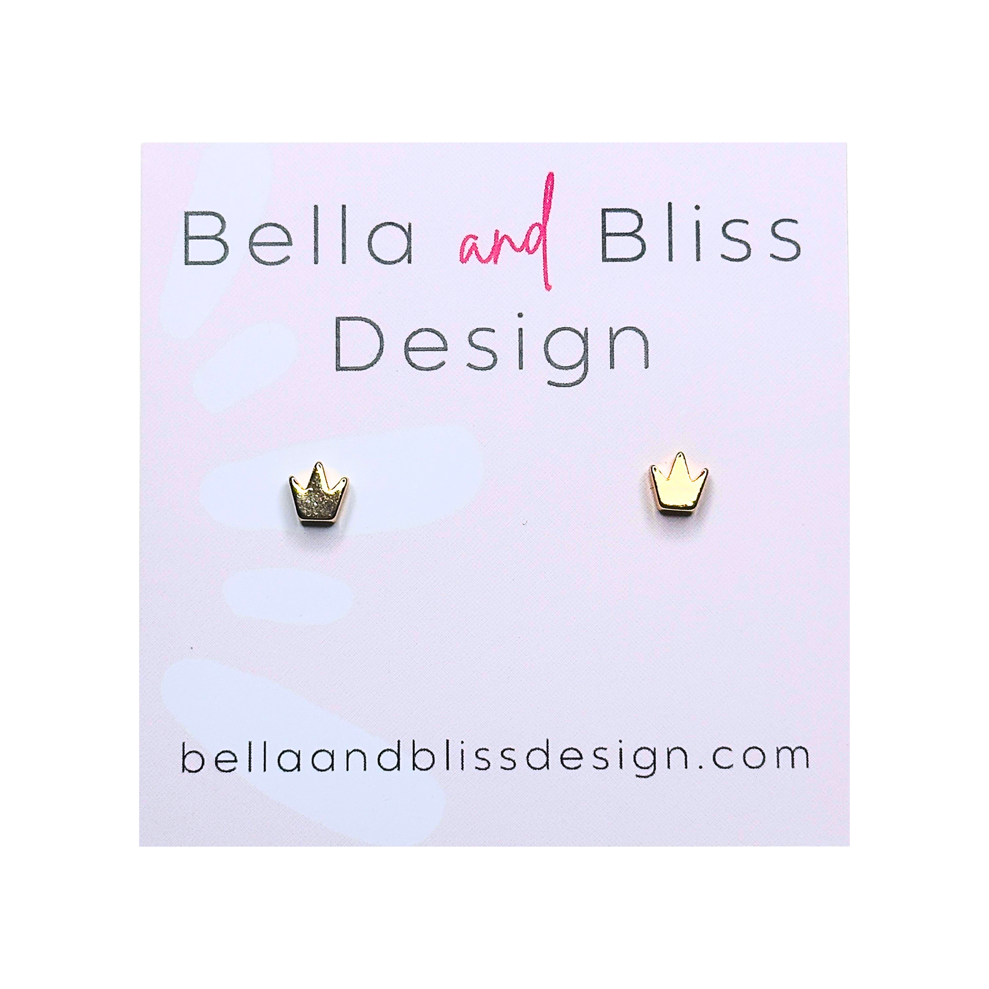 A pair of gold-colored mini stud earrings designed with a crown motif, presented on a white background with 'Bella and Bliss Design' branding.