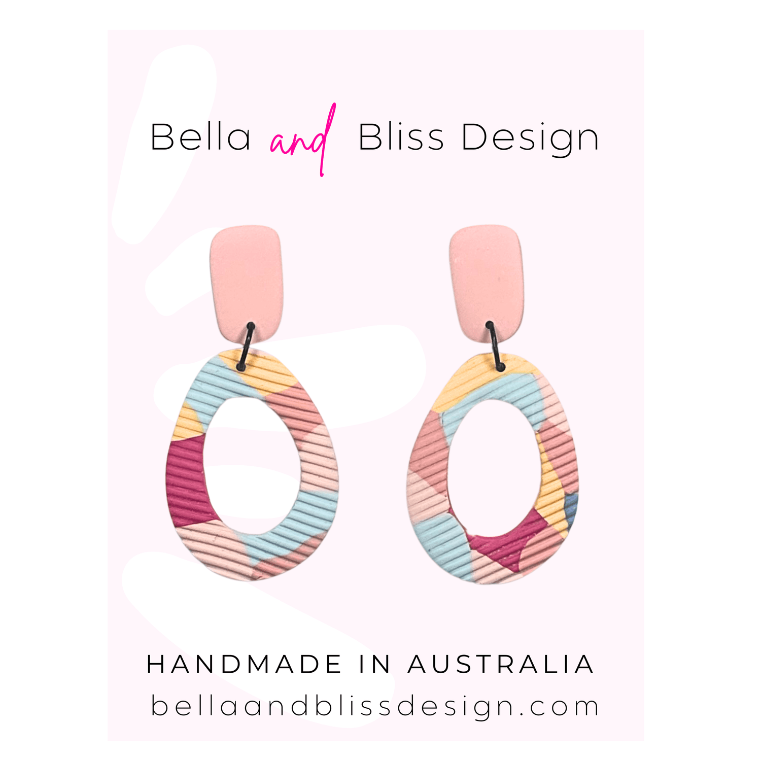 Colorful earrings with 'Bella and Bliss Design' branding on a pink background