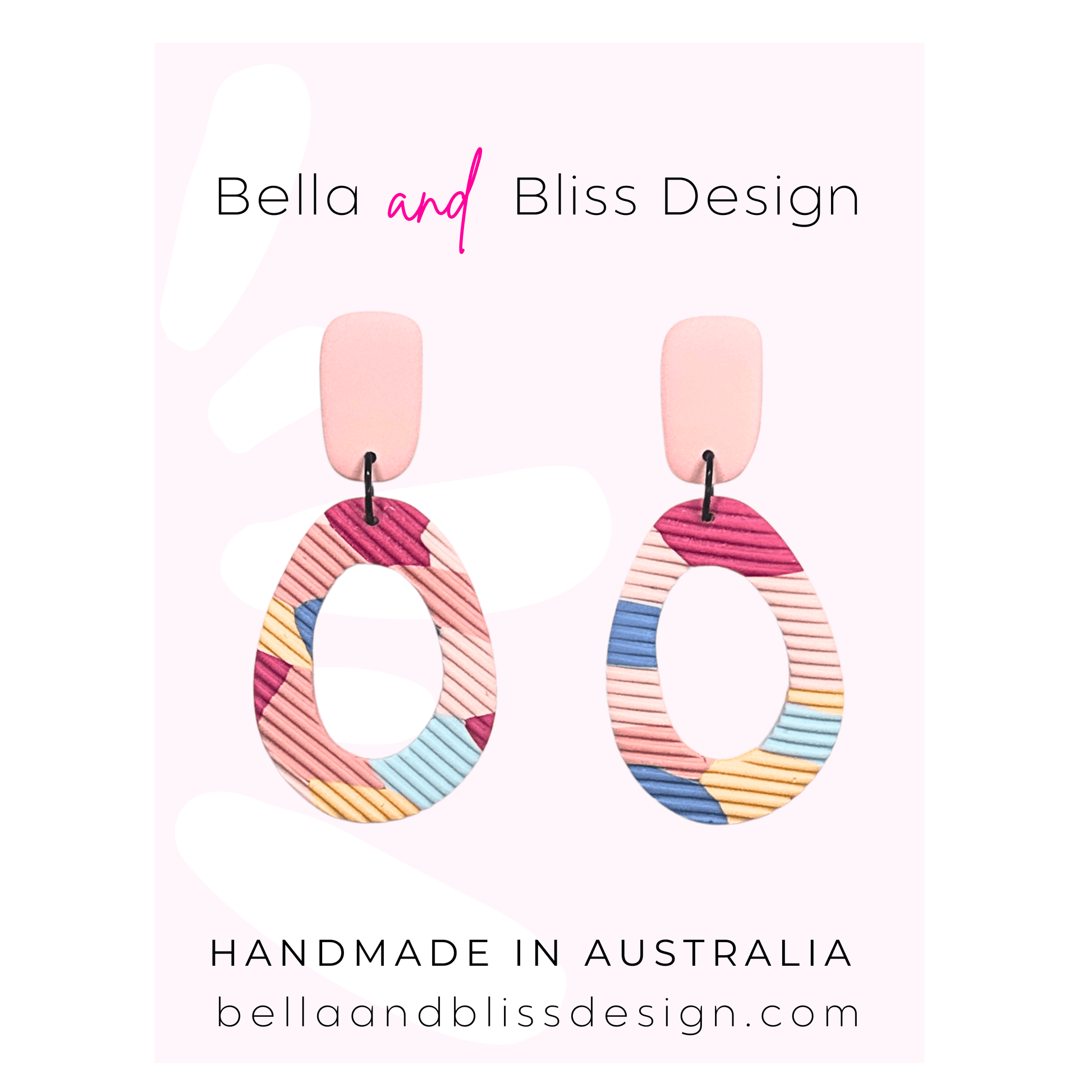 Colorful earrings with 'Bella and Bliss Design' branding on a pink background