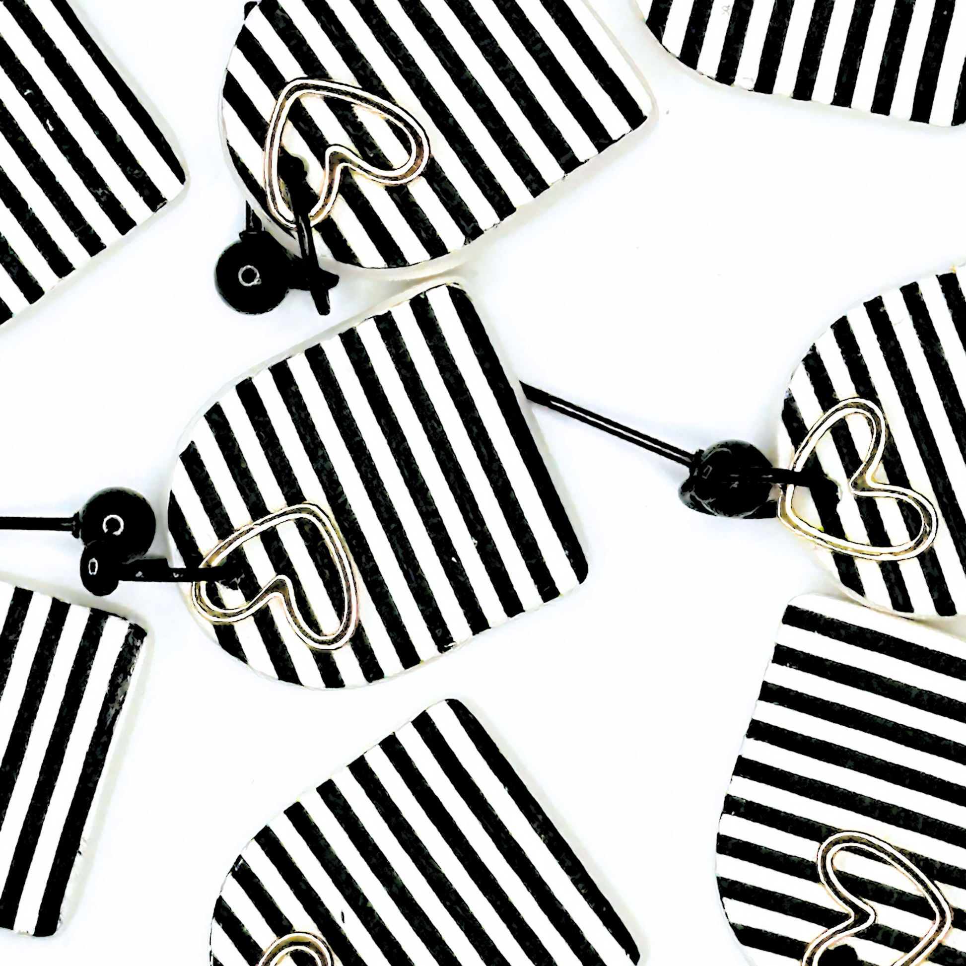 Heart-shaped on black and white striped 
