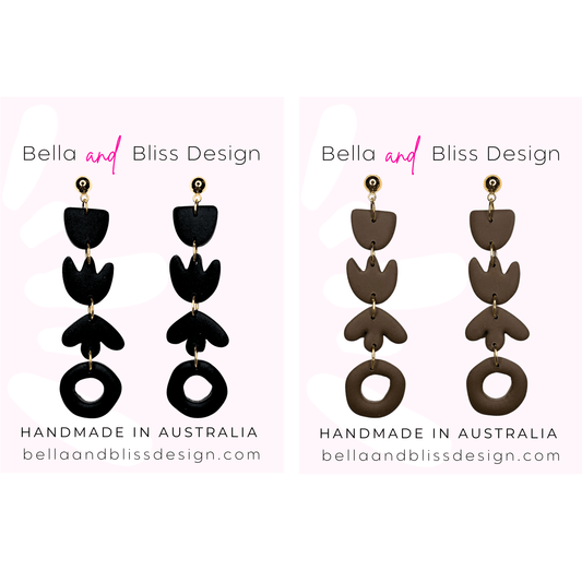 Pair of black and brown earrings with 'Bella and Bliss Design' branding on a white background.