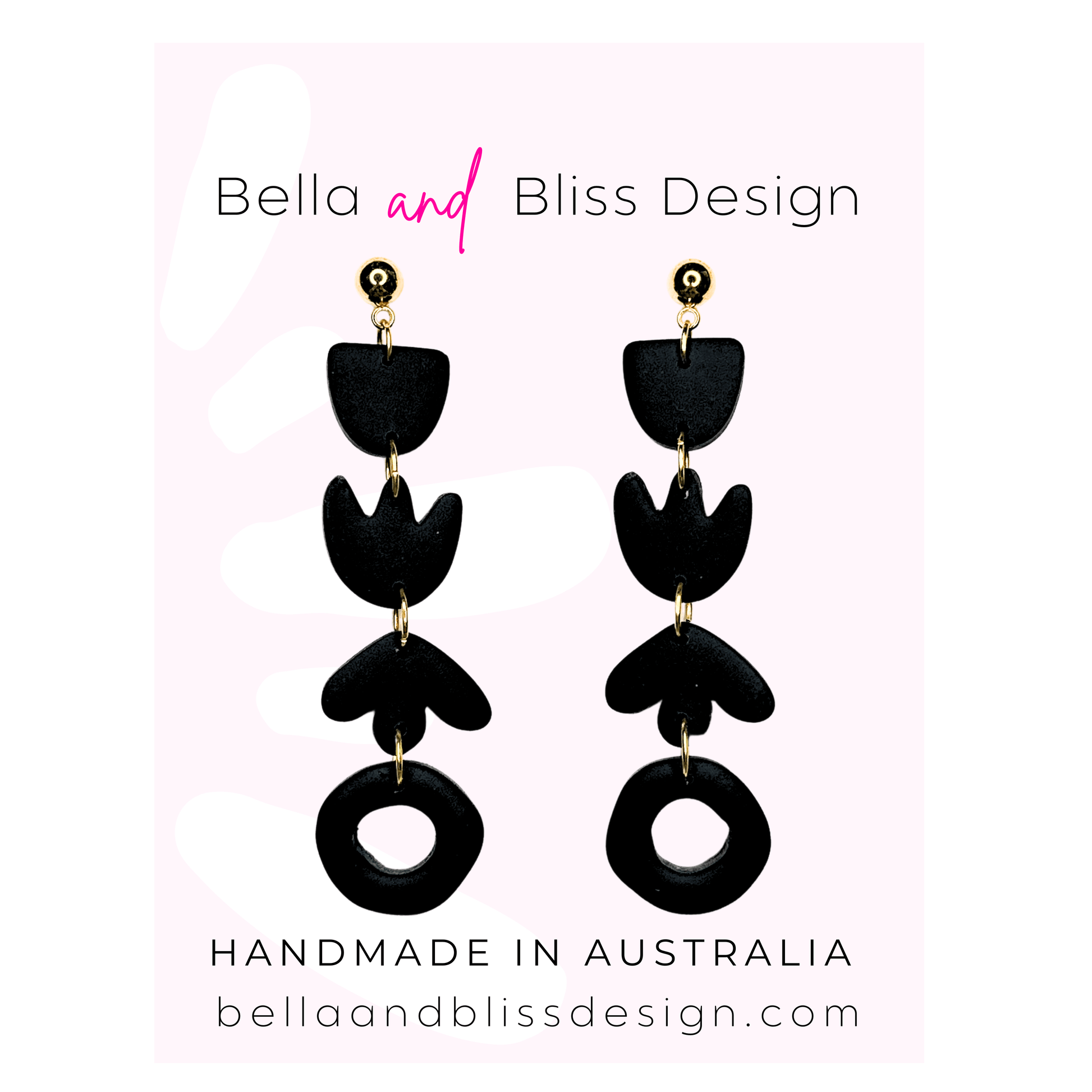 Black earrings on a pink background with 'Bella and Bliss Design' branding.