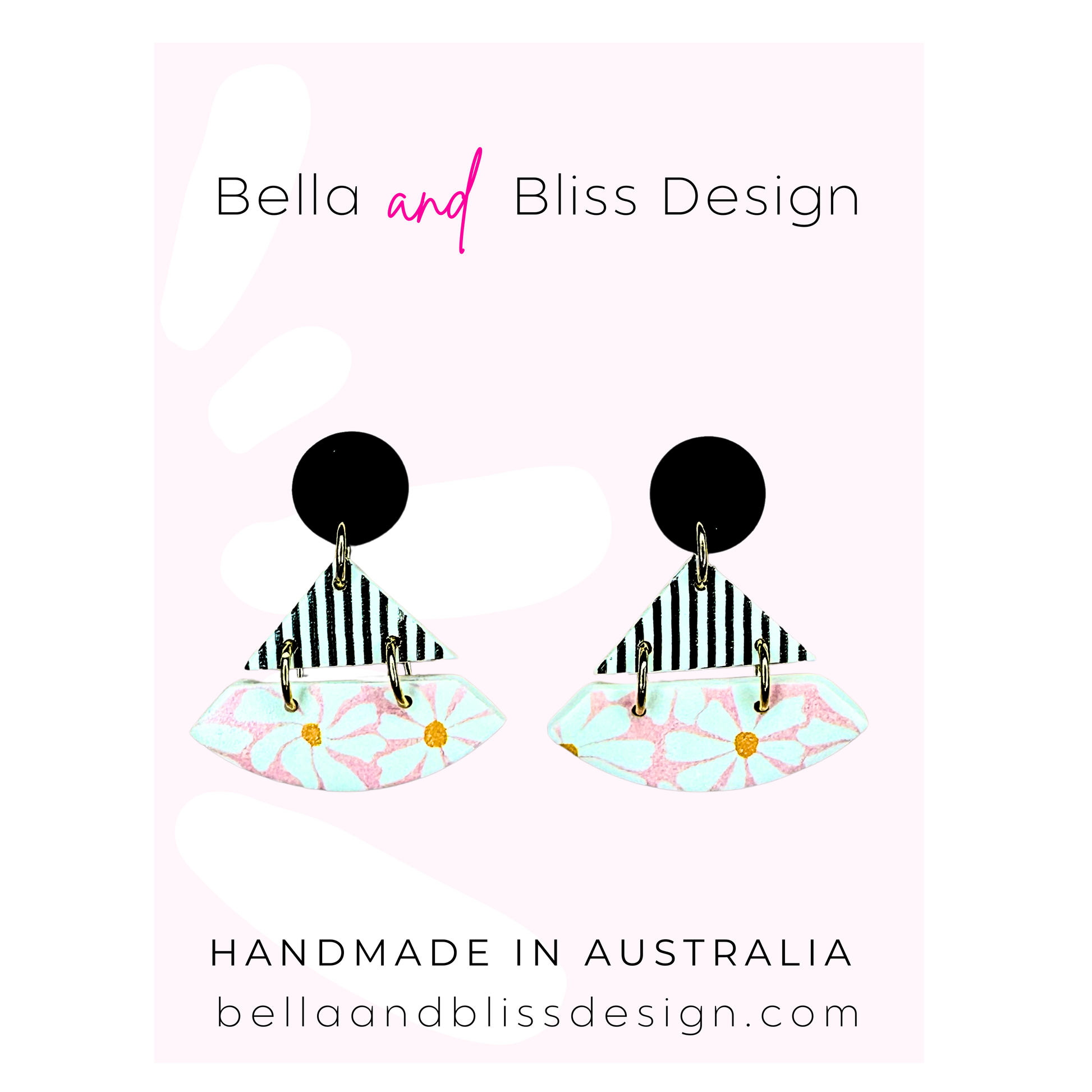 Earrings with colorful design on a light pink background, featuring 'Bella and Bliss Design' branding.