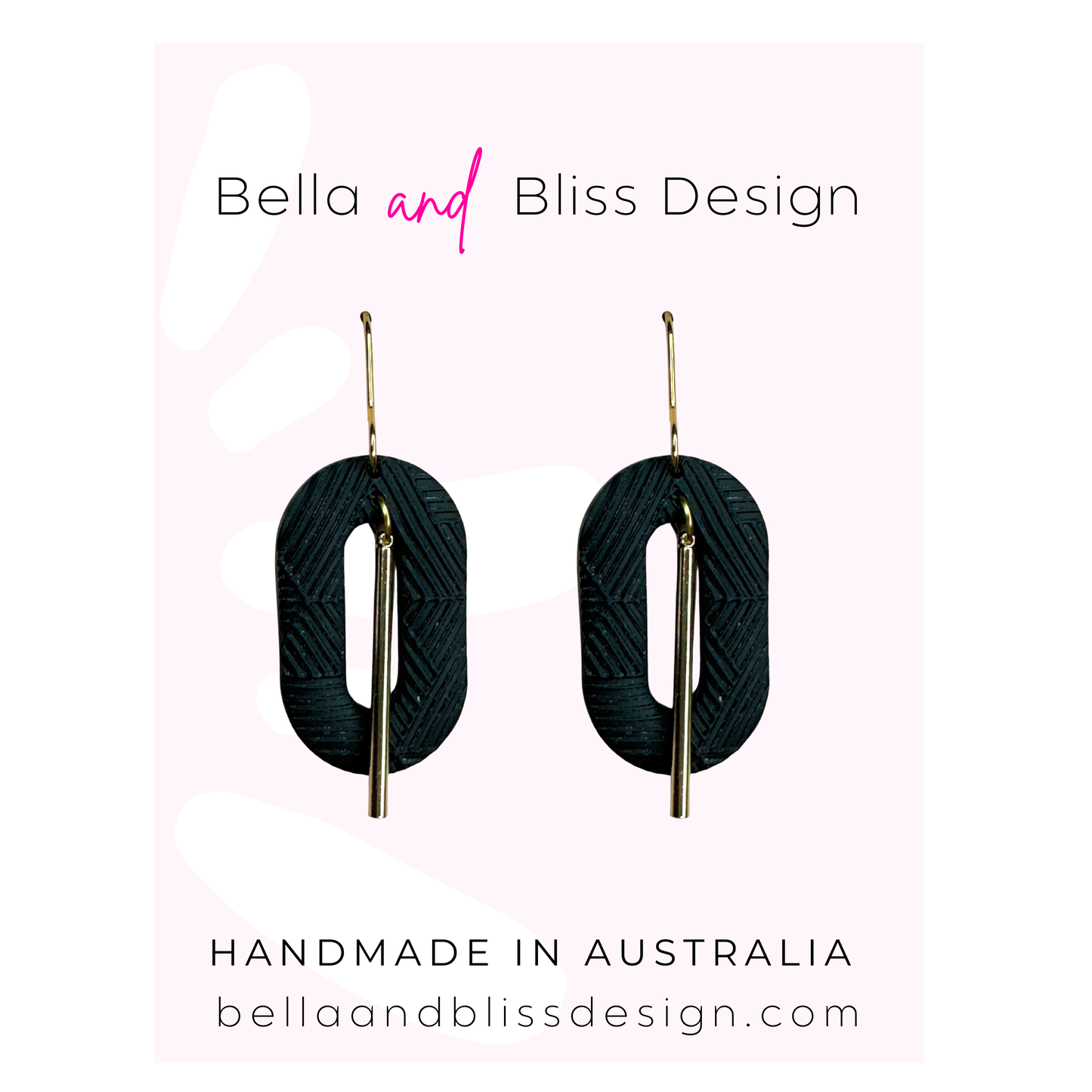 Black earrings with gold bars on a pink gradient background, featuring Bella and Bliss Design branding.