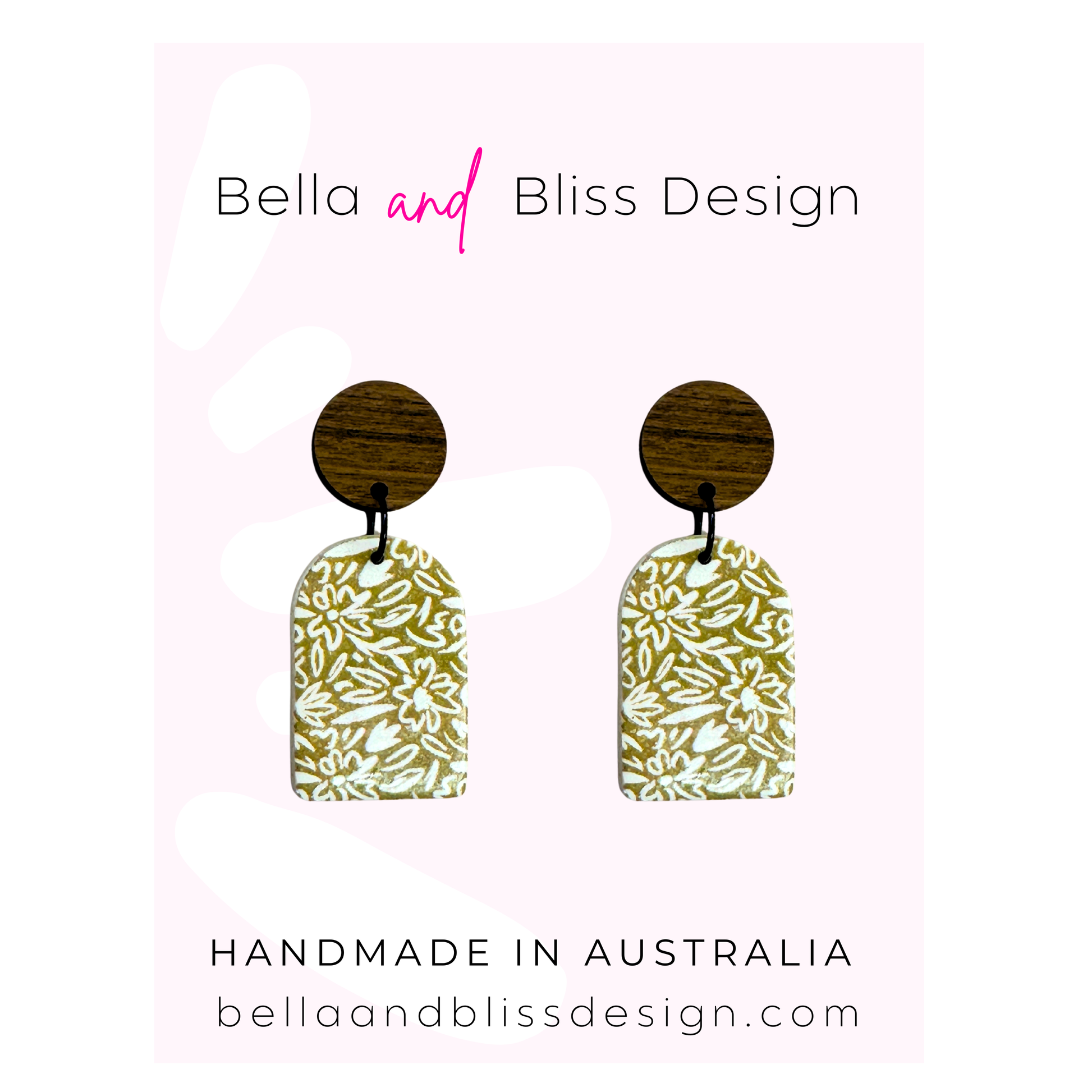 Floral earrings on a card with 'Bella and Bliss Design' branding.