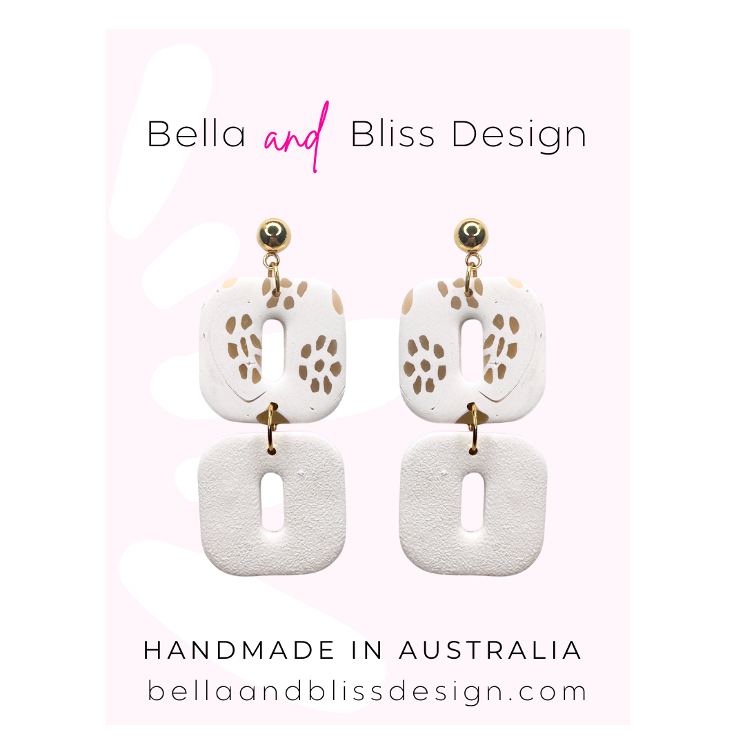 White and beige earrings
