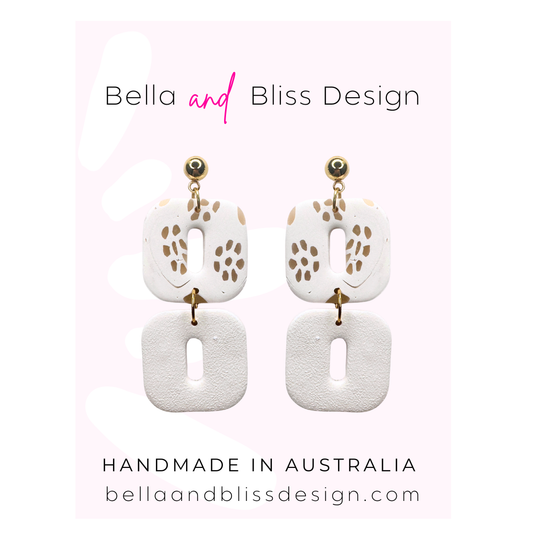White and beige earrings