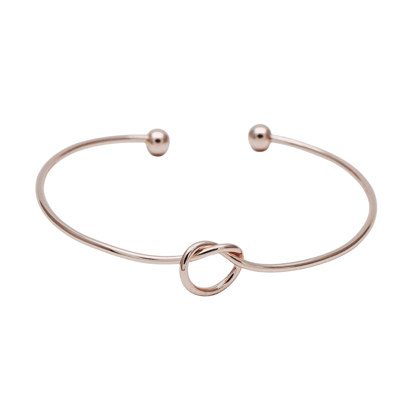 Rose Gold bangle with a knot design on a white background