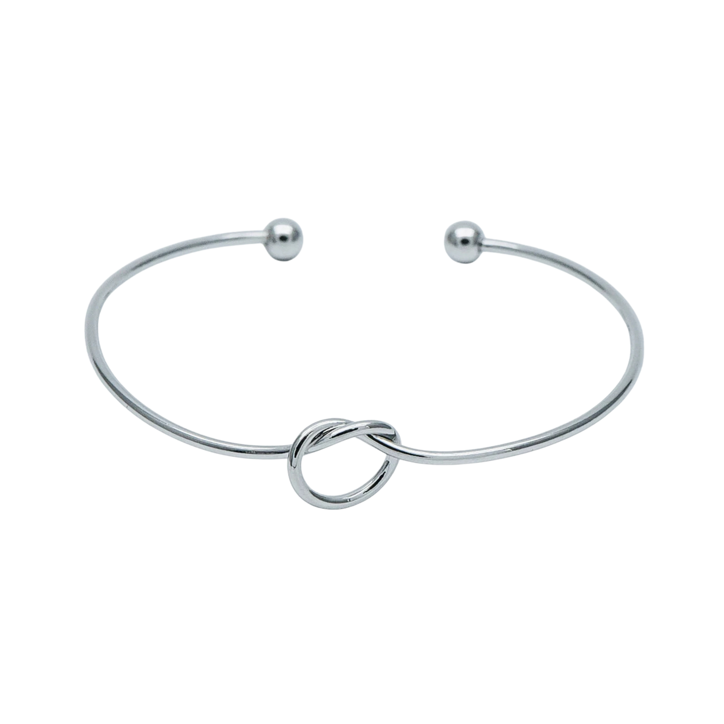 Silver bracelet with a knot design on a white background