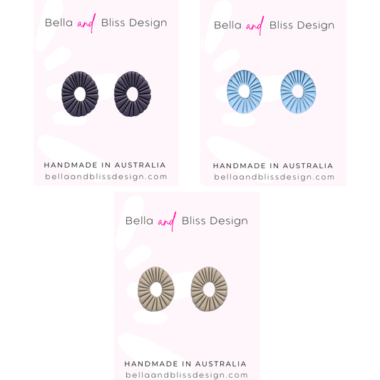 Earring display with Bella and Bliss Design branding on a white background