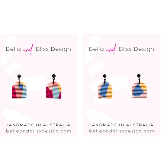 Colorful earrings with 'Bella and Bliss Design' branding on a white background.