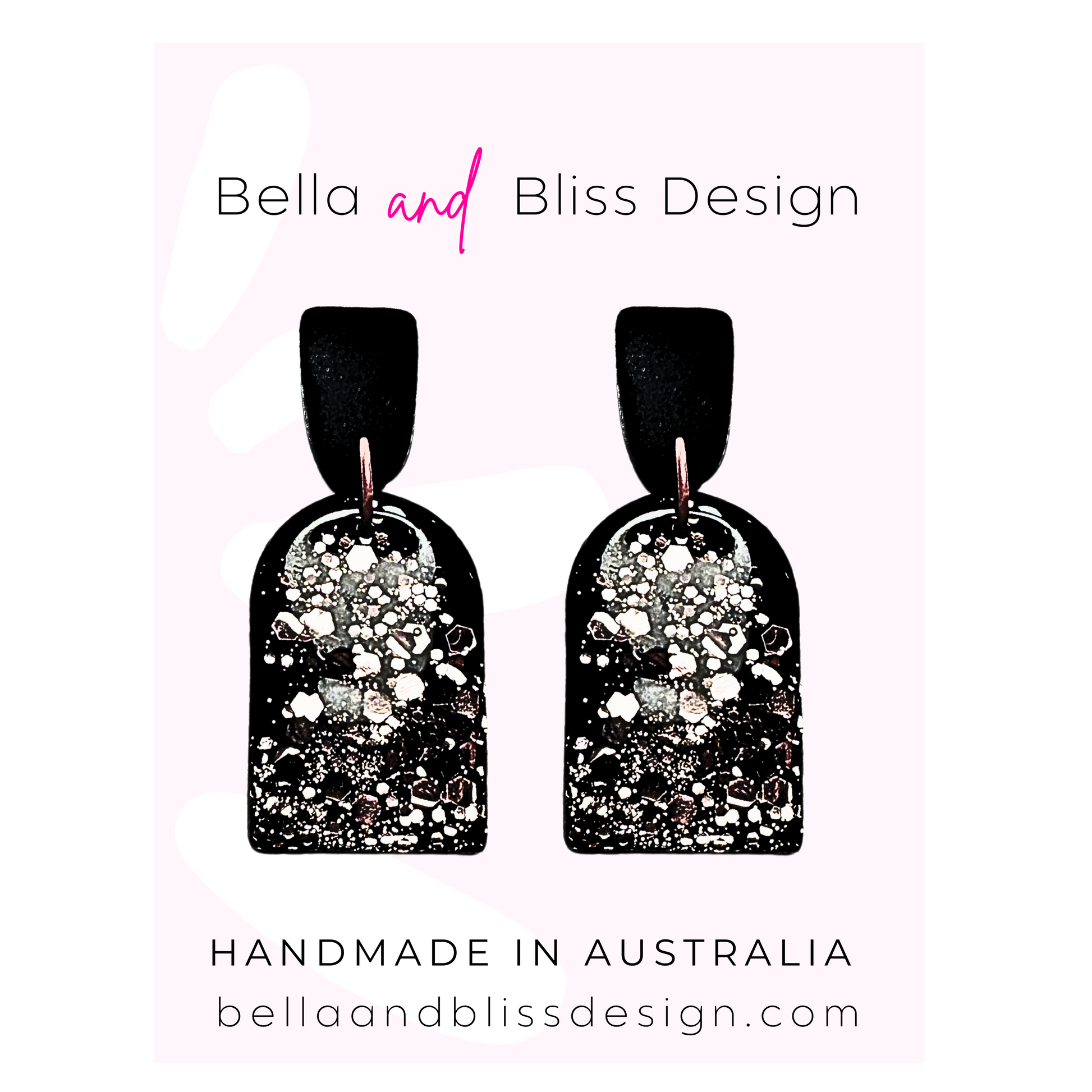 Black earrings with pink glitter  featuring Bella and Bliss Design branding.