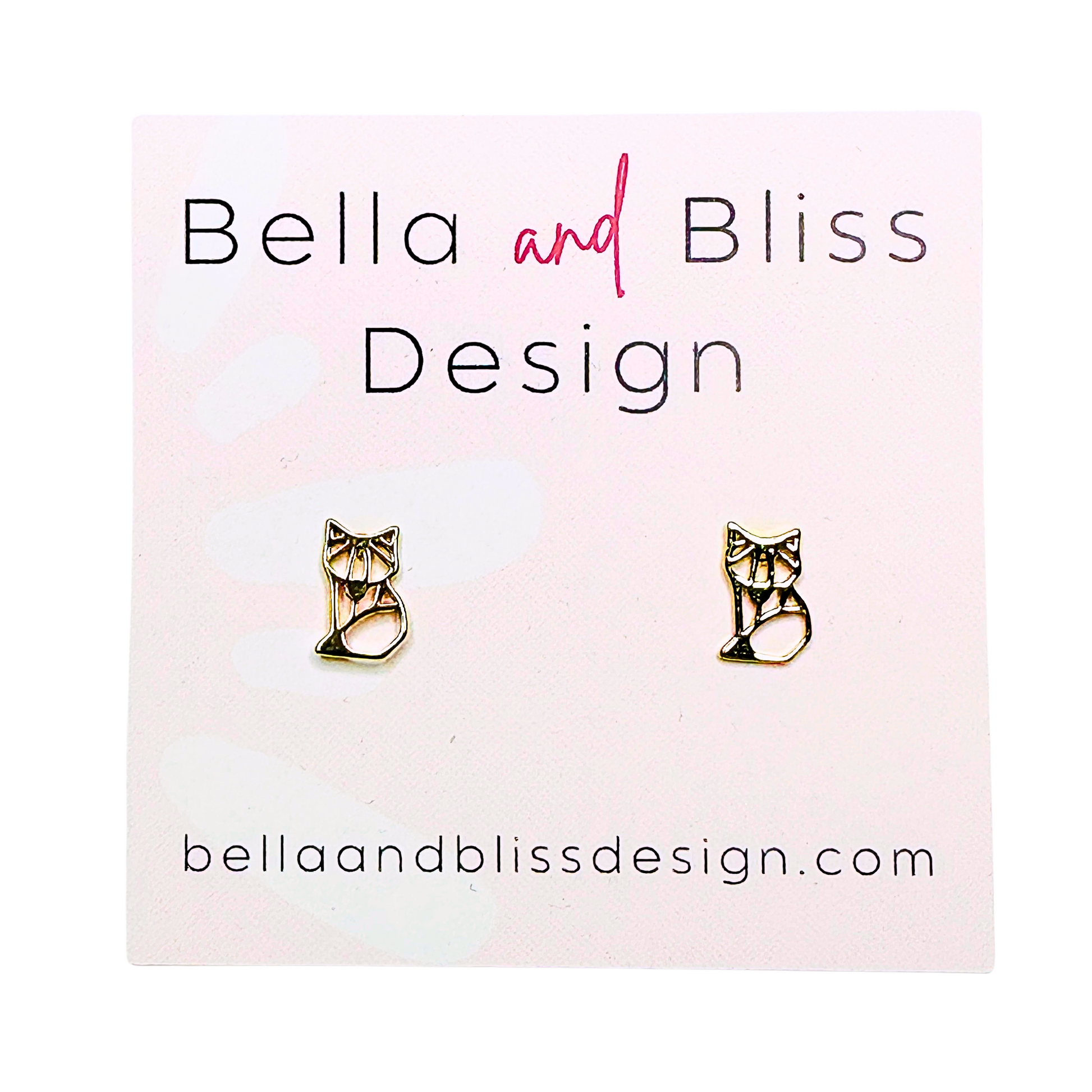 Gold fox-shaped earrings on a Bella and Bliss Design card with website URL.
