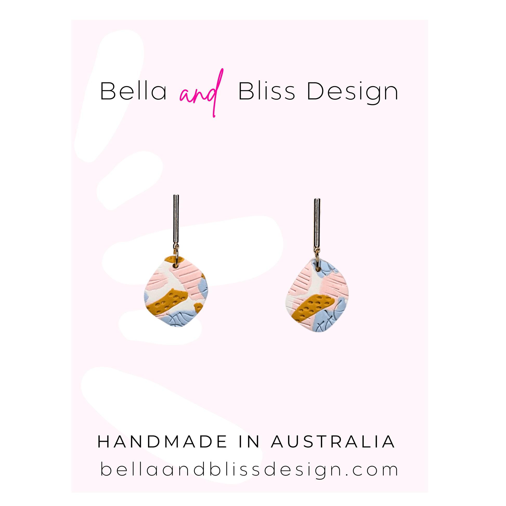 Colorful earrings with 'Bella and Bliss Design' branding on a light pink background.