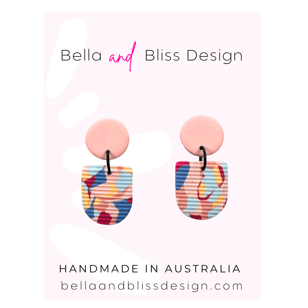 Colourful earrings with 'Bella and Bliss Design' branding on a white background.
