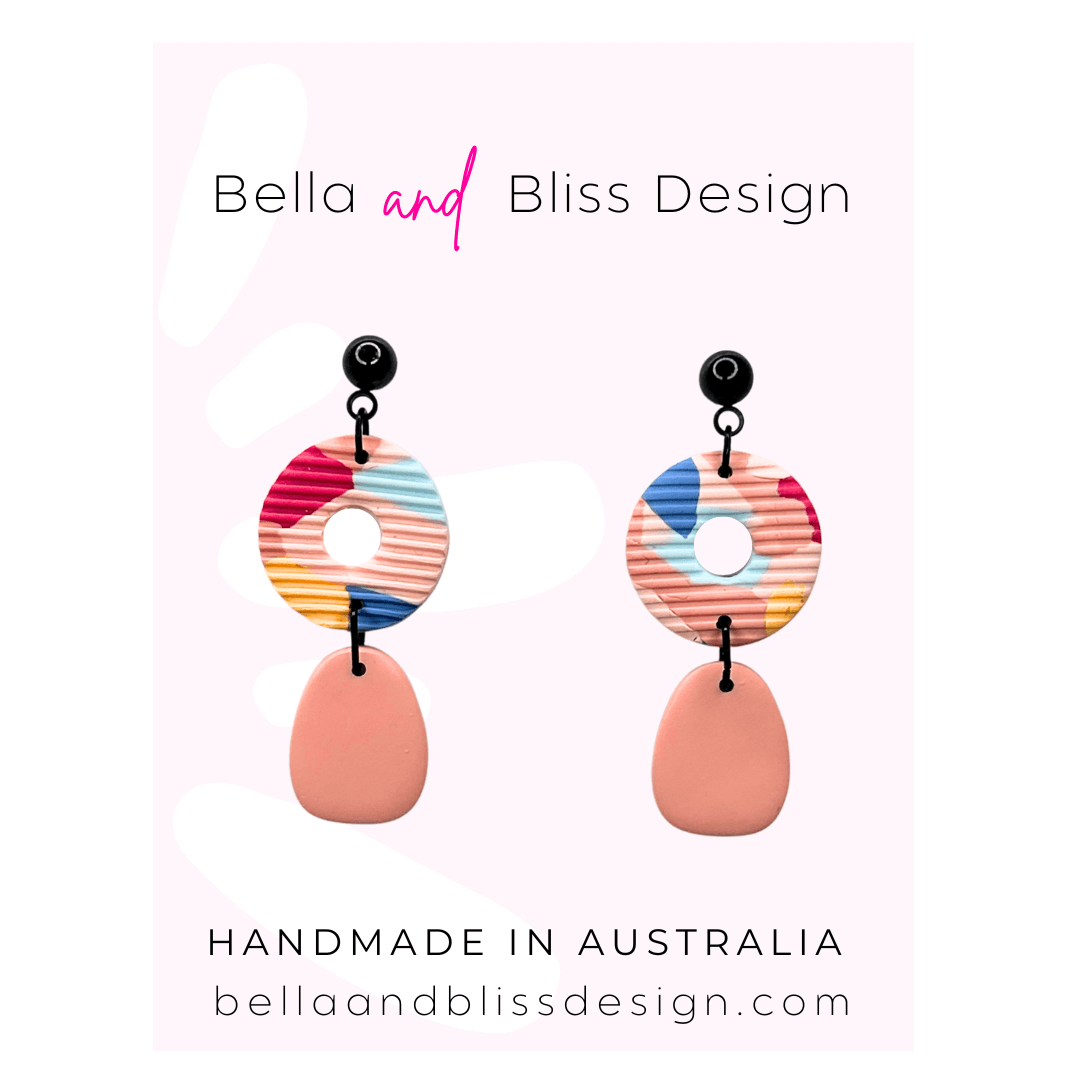 Colourful earrings with 'Bella and Bliss Design' branding on a white background.