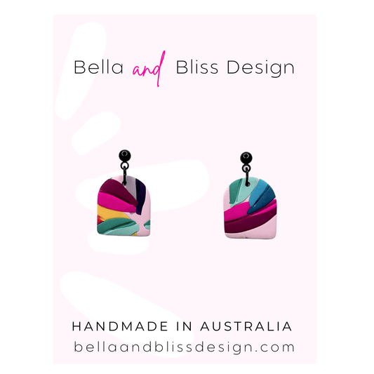 Colourful earrings with 'Bella and Bliss Design' branding on a white background.